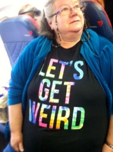 T-shirt says: Let's Get Weird!