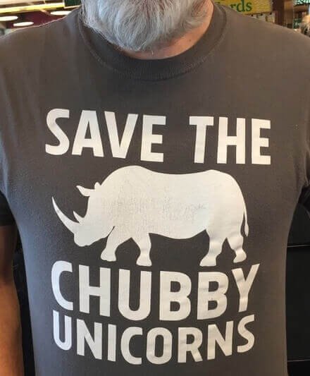 T-shirt with silhouette of a rhino that reads: Save The Chubby Unicorns